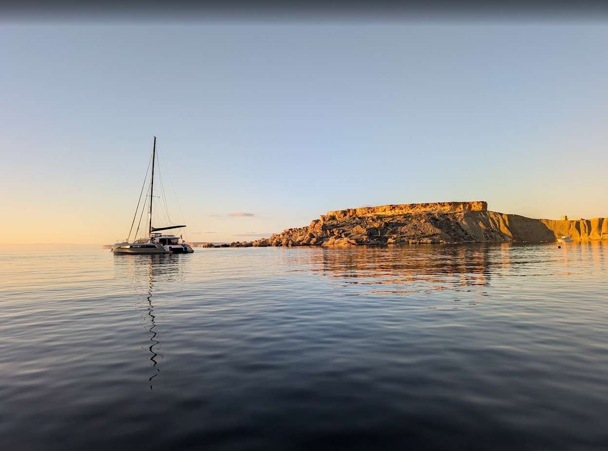 MYMLAN II Privilege Signature 580 - anchored near an island
