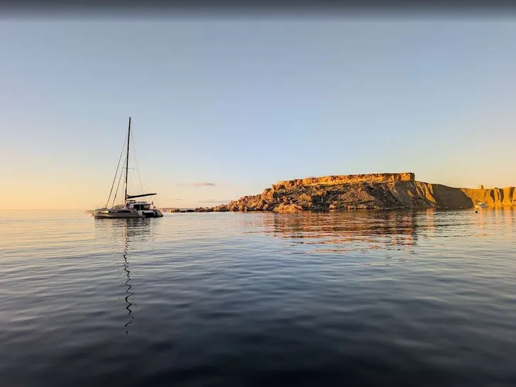 MYMLAN II Privilege Signature 580 - anchored near an island MYMLAN II Privilege Signature 580 - anchored near an island