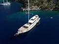 DODO Custom Motor Sailer 43m - anchored near an island DODO Custom Motor Sailer 43m - anchored near an island