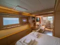 MY OFFICE Lagoon 62 - master cabin bed and window MY OFFICE Lagoon 62 - master cabin bed and window