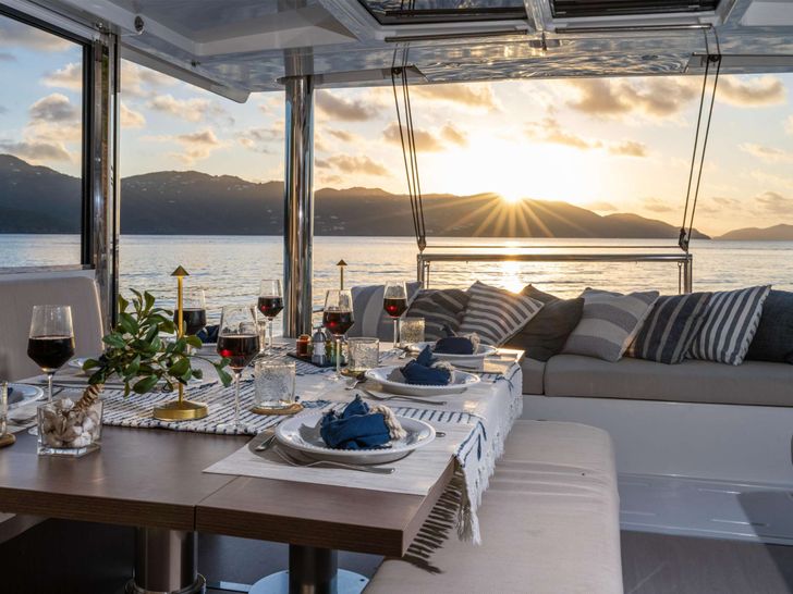 ISLAND STANDARD TIME Bali 4.8 - dining set up under the sunset ISLAND STANDARD TIME Bali 4.8 - dining set up under the sunset
