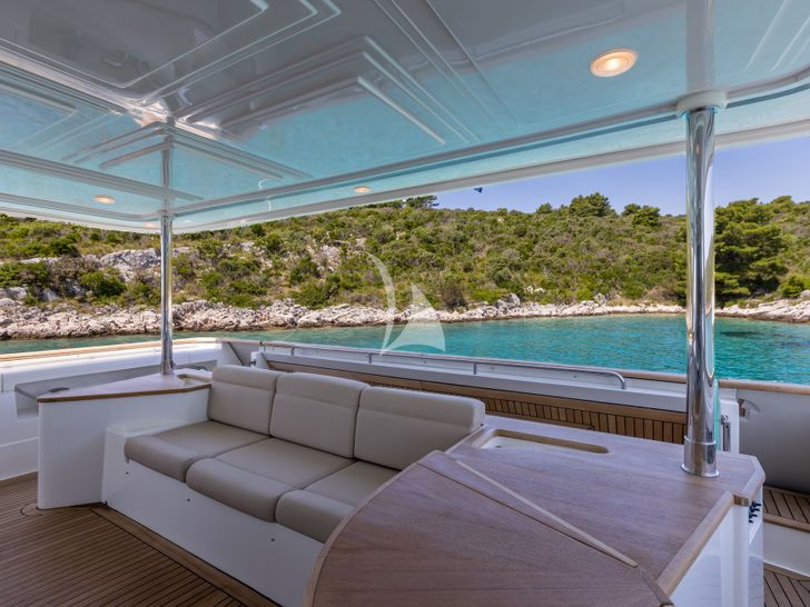 KLOBUK Ferretti Custom Line Navetta 30 - aft deck seating area KLOBUK Ferretti Custom Line Navetta 30 - aft deck seating area