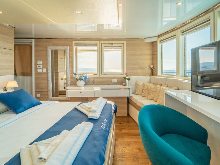 RIVA Custom 48m - master cabin bed and seating area RIVA Custom 48m - master cabin bed and seating area