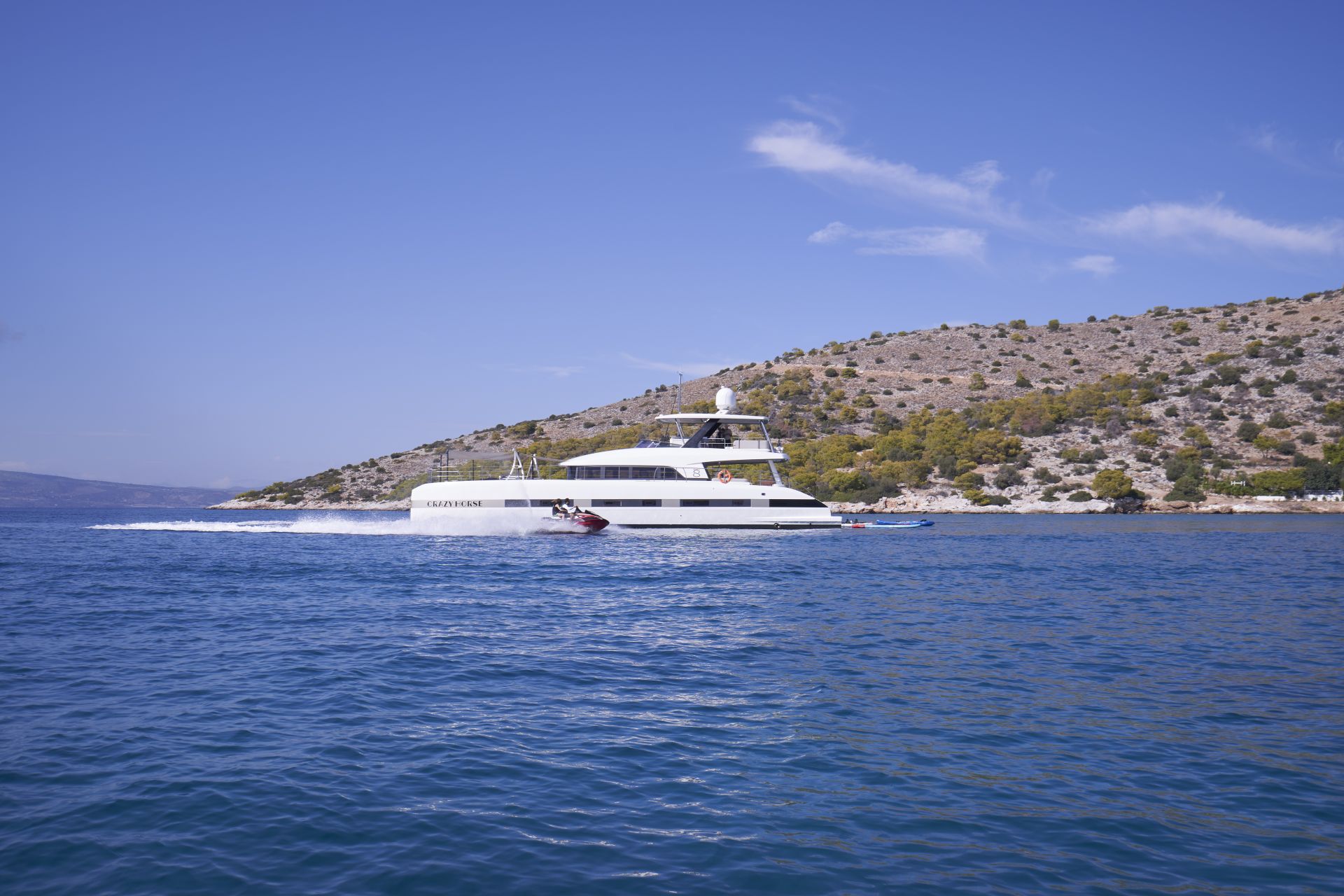CRAZY HORSE Lagoon 78 - anchored with the jet ski