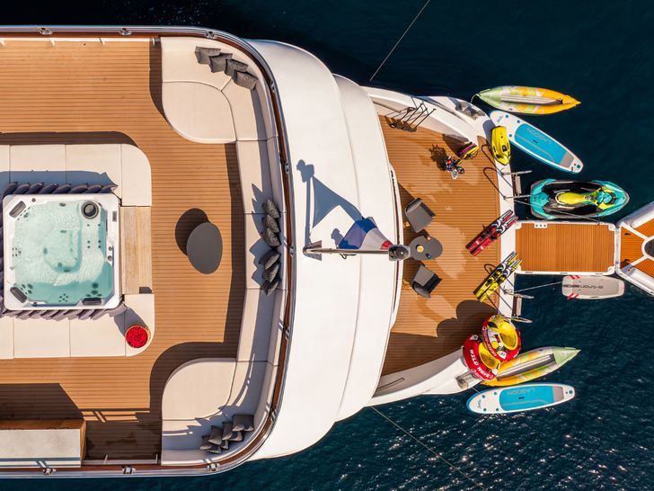 ALFA MARIO Custom 52m - aft shot with the jacuzzi and water toys ALFA MARIO Custom 52m - aft shot with the jacuzzi and water toys