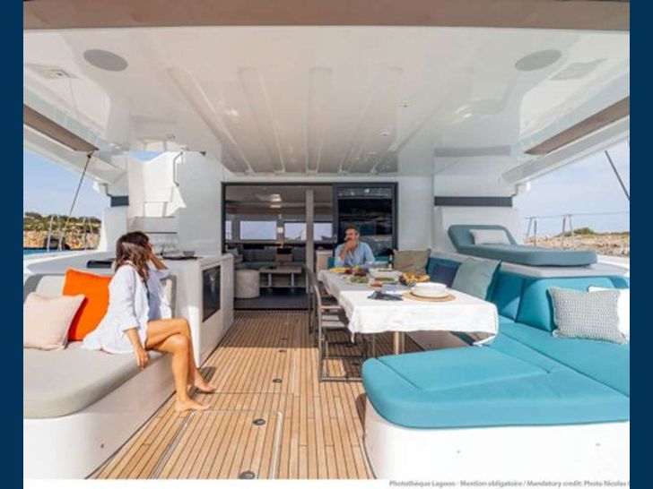 TRI WING - Lagoon 55,aft deck lounge and alfresco dining area