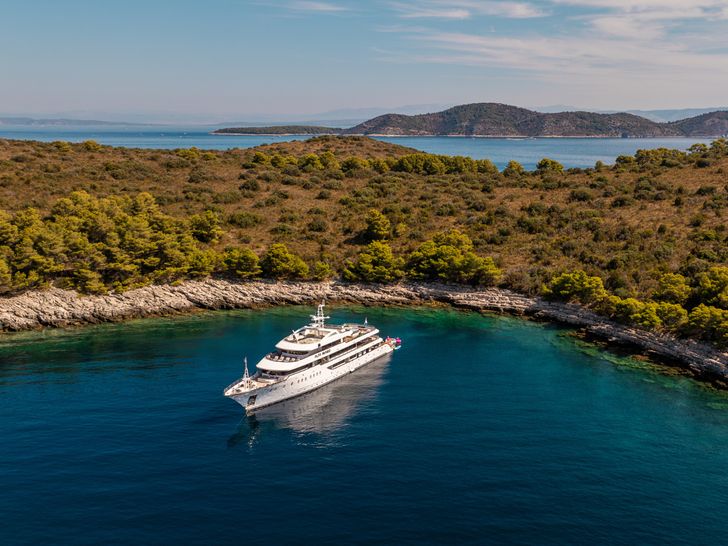 ALFA MARIO Custom 52m - anchored near an island ALFA MARIO Custom 52m - anchored near an island