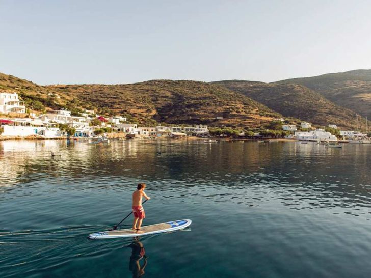 Paddle Boarding on calm waters Paddle Boarding on calm waters