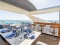 4 PLAY Azimut 88 Flybridge - flybridge dining area and bar area