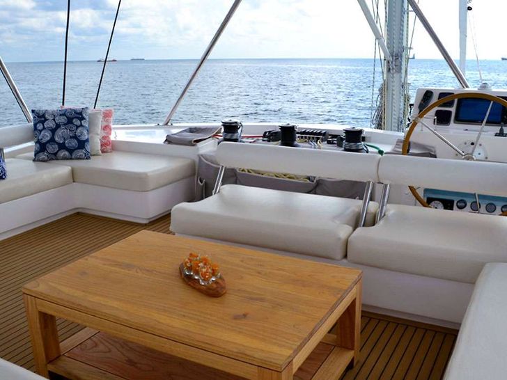 Flybridge seating with new teak table Flybridge seating with new teak table