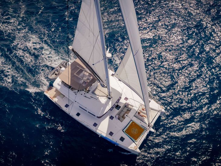 BLUEWINDS Lagoon 560 - aerial shot cruising BLUEWINDS Lagoon 560 - aerial shot cruising
