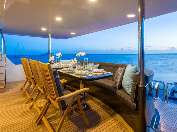 UNBRIDLED Crescent 11 - aft deck alfresco dining set up UNBRIDLED Crescent 11 - aft deck alfresco dining set up