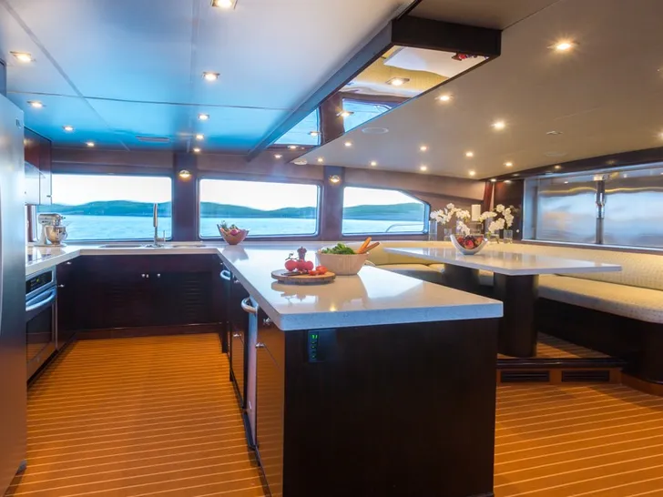 UNBRIDLED Crescent 11 - galley with country dining UNBRIDLED Crescent 11 - galley with country dining
