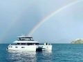 CUTE LITTLE CAT Lagoon 630 - anchored under the rainbow CUTE LITTLE CAT Lagoon 630 - anchored under the rainbow