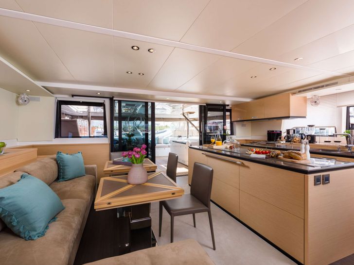 OPAL Lagoon 620 - saloon seating and galley OPAL Lagoon 620 - saloon seating and galley