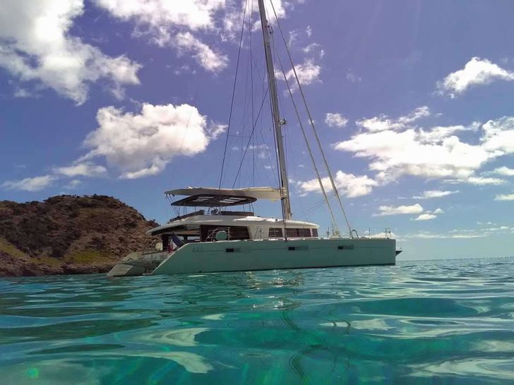 LADY M Lagoon 620 anchored with waterline