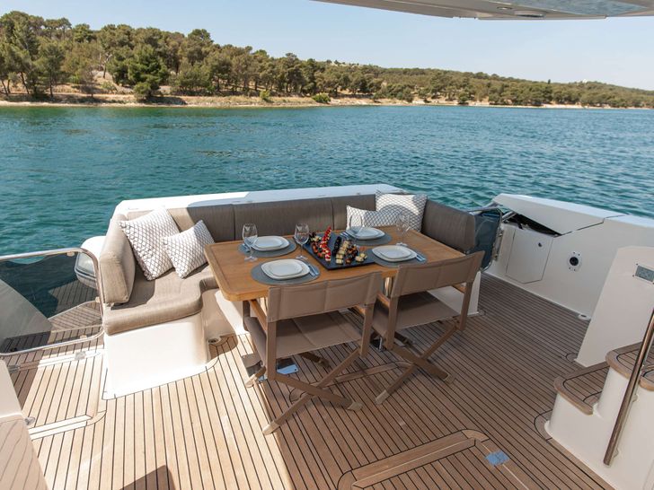 LE CHIFFRE - Galeon 640 Fly,aft alfresco dining area LE CHIFFRE - Galeon 640 Fly,aft alfresco dining area