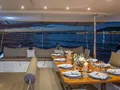 NEW HORIZONS 2 Fountaine Pajot Saba 50 - alfresco dining set up NEW HORIZONS 2 Fountaine Pajot Saba 50 - alfresco dining set up