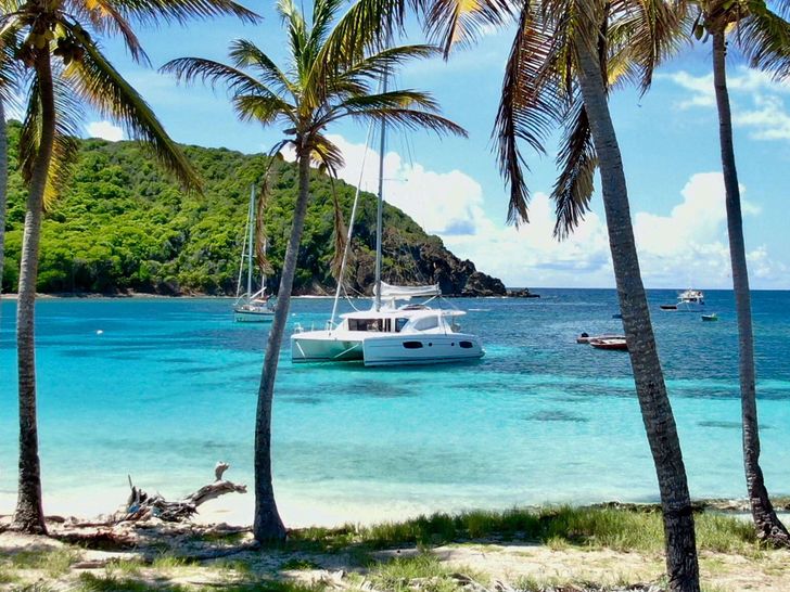GROOVY Robertson and Caine 42 - anchored near an island GROOVY Robertson and Caine 42 - anchored near an island