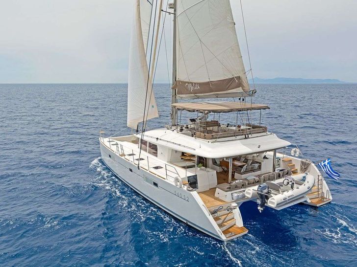 MELITI Lagoon 560 - cruising aft shot MELITI Lagoon 560 - cruising aft shot