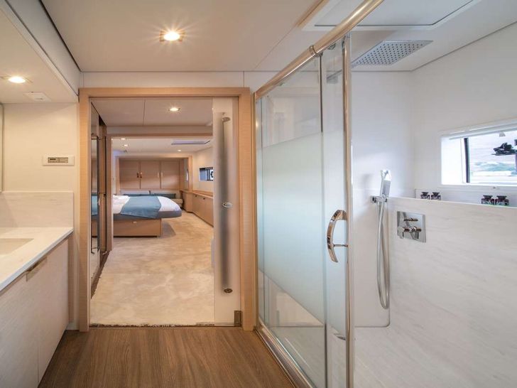 AETHER Fountaine Pajot Alegria 67 - master cabin bathroom wide shot AETHER Fountaine Pajot Alegria 67 - master cabin bathroom wide shot