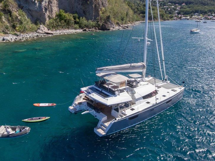 ARAOK Fountaine Pajot Ipanema 58 - aerial anchored shot with water toys ARAOK Fountaine Pajot Ipanema 58 - aerial anchored shot with water toys