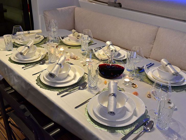 ADRIATIC TIGER Lagoon 620 - formal dining set up ADRIATIC TIGER Lagoon 620 - formal dining set up