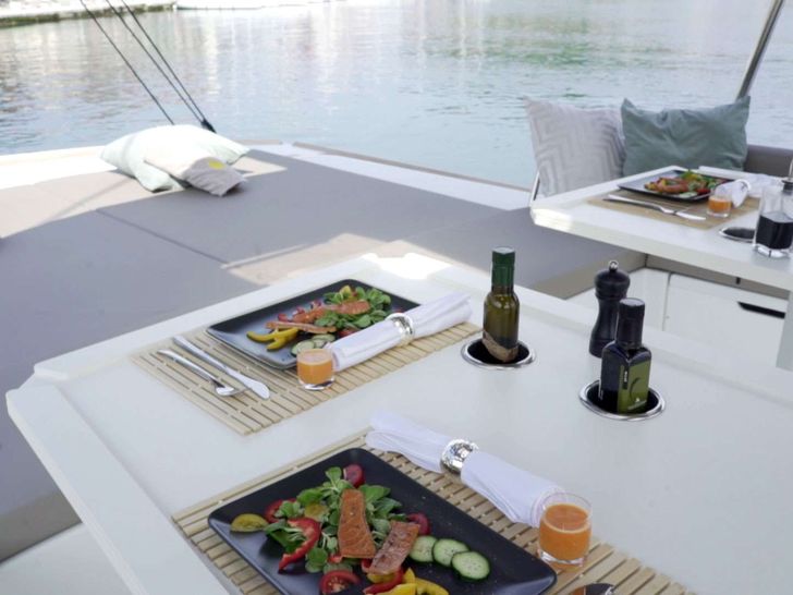 NAMASTE OF BALI Bali 5.4 - foredeck dining and bronzing area NAMASTE OF BALI Bali 5.4 - foredeck dining and bronzing area