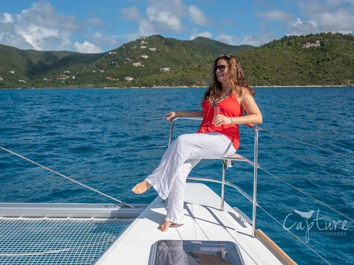 GRACE Lagoon 52 - guest on the foredeck GRACE Lagoon 52 - guest on the foredeck