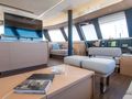 SERENISSIMA Fountaine Pajot Alegria 67 - saloon seating with TV SERENISSIMA Fountaine Pajot Alegria 67 - saloon seating with TV