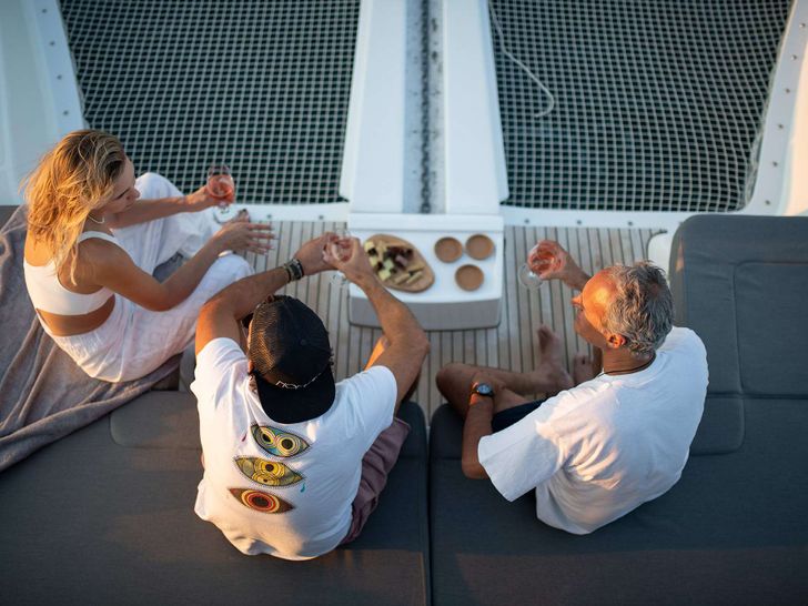 NOMAD II - sundowner cocktails on foredeck NOMAD II - sundowner cocktails on foredeck