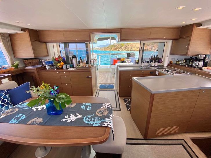 RAPSCALLION - Lagoon 450,saloon,dining,and galley RAPSCALLION - Lagoon 450,saloon,dining,and galley