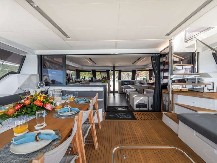 MY TY Fountaine Pajot Alegria 67 - alfresco dining set up MY TY Fountaine Pajot Alegria 67 - alfresco dining set up