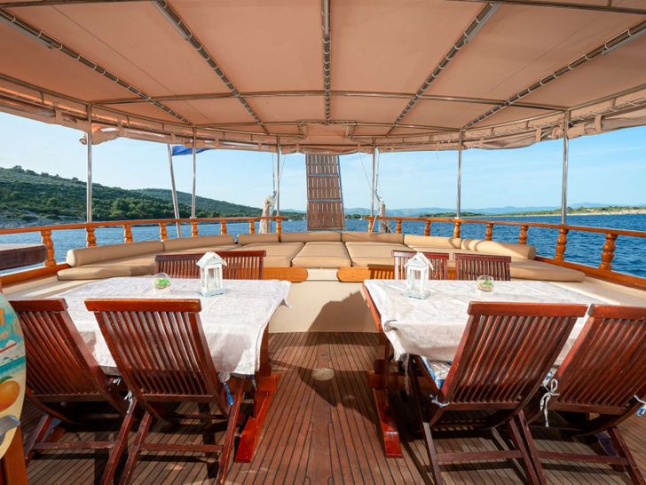 DONA Custom Sailing Yacht 25m - aft alfresco dining area DONA Custom Sailing Yacht 25m - aft alfresco dining area