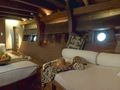 SILOLONA Phinisi 50m - master cabin bed and seating area SILOLONA Phinisi 50m - master cabin bed and seating area