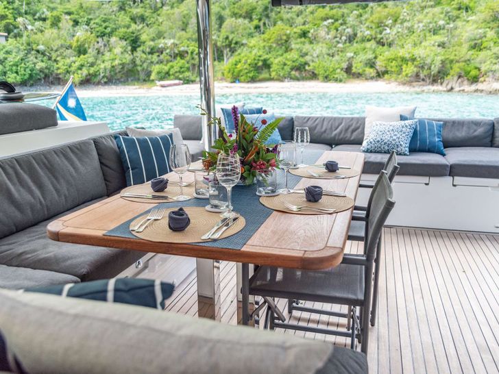 RESPITE AT SEA Lagoon 56 - aft deck dining area RESPITE AT SEA Lagoon 56 - aft deck dining area
