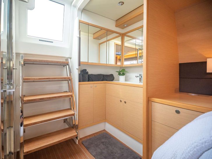 RESPITE AT SEA Lagoon 56 - VIP cabin 1 entry to the aft deck RESPITE AT SEA Lagoon 56 - VIP cabin 1 entry to the aft deck