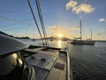 CALMA Sunreef 60 - foredeck under the sunset CALMA Sunreef 60 - foredeck under the sunset