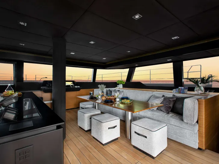 CALMA Sunreef 60 - saloon seating and dining CALMA Sunreef 60 - saloon seating and dining