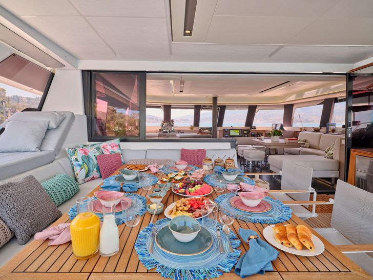 KIMATA Fountaine Pajot Alegria 67 - aft alfresco dining set up KIMATA Fountaine Pajot Alegria 67 - aft alfresco dining set up