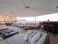 MIRAGE Feadship 53m - sky deck bar lounge during the day MIRAGE Feadship 53m - sky deck bar lounge during the day