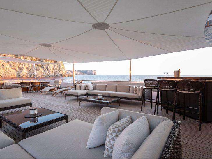 MIRAGE Feadship 53m - sky deck bar lounge during the day MIRAGE Feadship 53m - sky deck bar lounge during the day