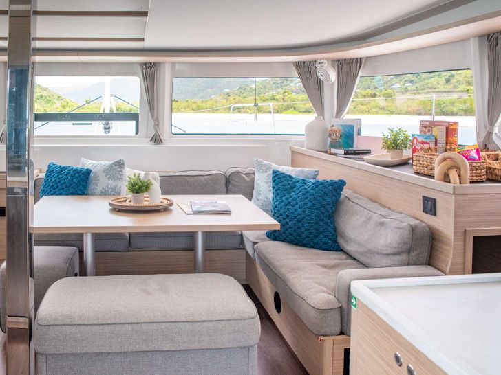 ON A WHIM III Lagoon 46 - saloon seating and dining area ON A WHIM III Lagoon 46 - saloon seating and dining area