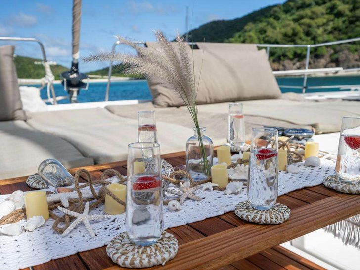 ELYSIAN Bali 5.4 - foredeck alfresco dining set up ELYSIAN Bali 5.4 - foredeck alfresco dining set up