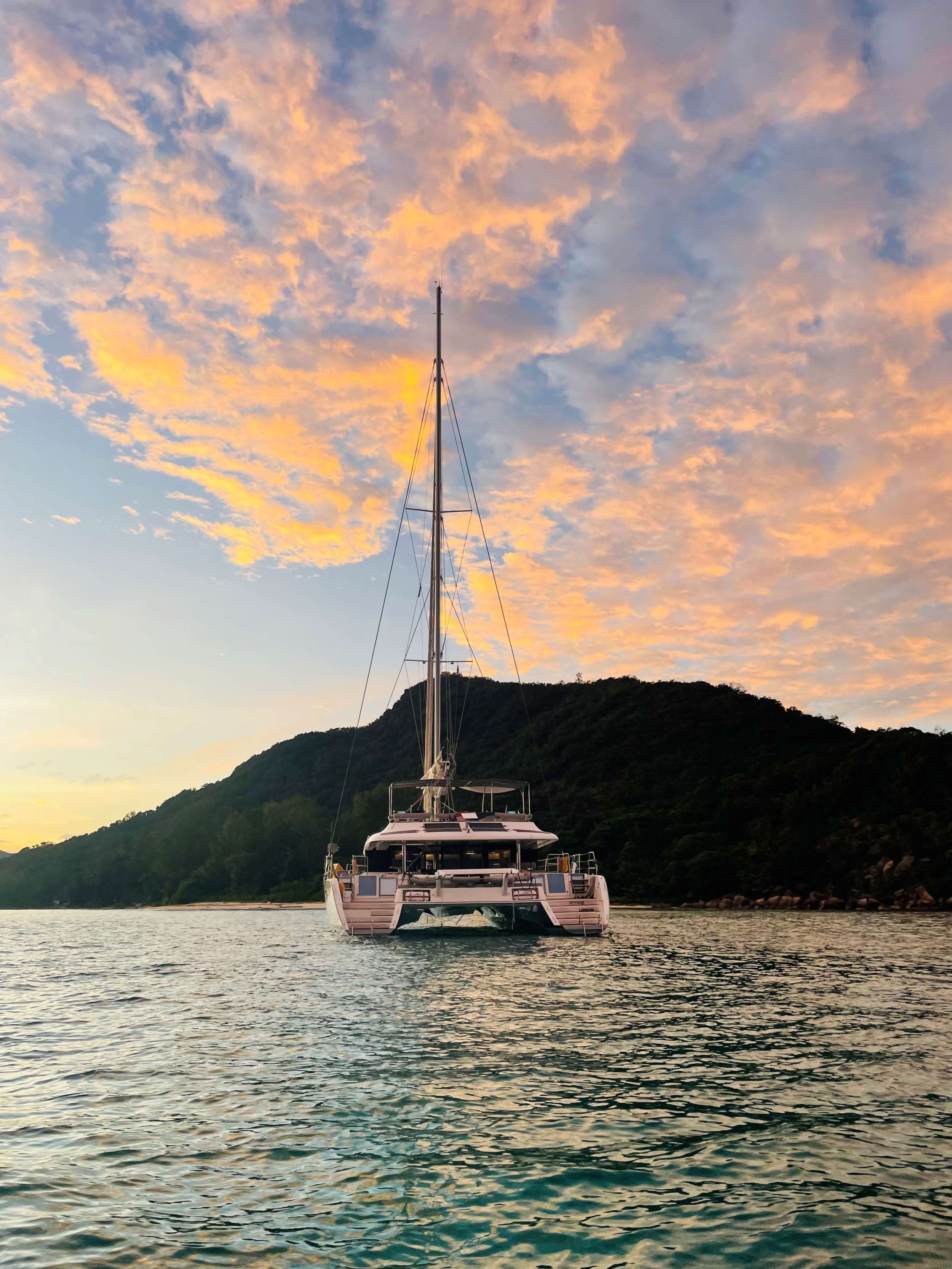 REVE2MER Lagoon 620 - aft shot under the sunset