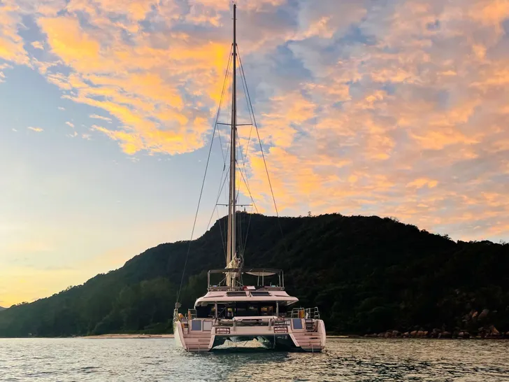 REVE2MER Lagoon 620 - aft shot under the sunset REVE2MER Lagoon 620 - aft shot under the sunset