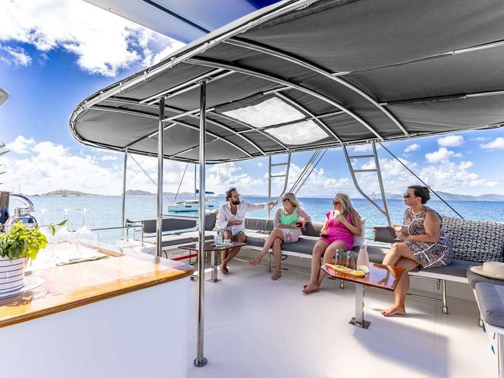 TRUE STORY Fountaine Pajot Victoria 67 - guests on the flybridge TRUE STORY Fountaine Pajot Victoria 67 - guests on the flybridge
