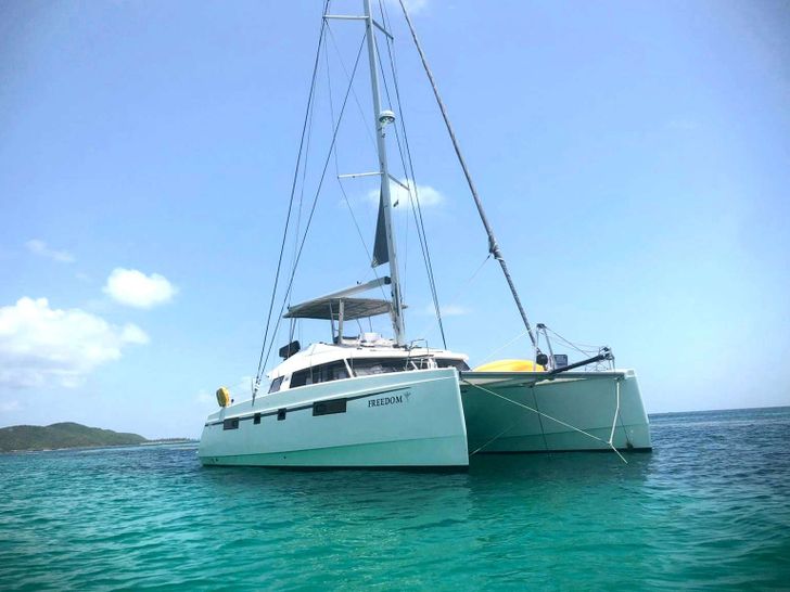 FREEDOM is a Nautitech 46 Catamaran with Flybridge based in the Windward Islands operating charters between Grenada and Antigua. The sailing catamran offers three guest cabins(for 6 guests). The starboard aft cabin has en-suite heads and separate sta FREEDOM is a Nautitech 46 Catamaran with Flybridge based in the Windward Islands operating charters between Grenada and Antigua. The sailing catamran offers three guest cabins(for 6 guests). The starboard aft cabin has en-suite heads and separate sta
