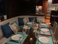 AMMONITE Nordhavn Custom 23m dinner set up AMMONITE Nordhavn Custom 23m dinner set up
