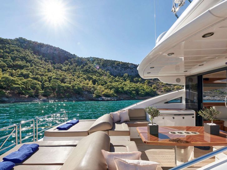 ESTIA ONE - Princess UK 70,aft deck with dining area and sun beds ESTIA ONE - Princess UK 70,aft deck with dining area and sun beds